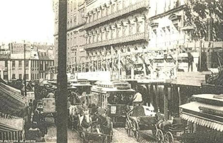 A photograph of a crowded street in Boston