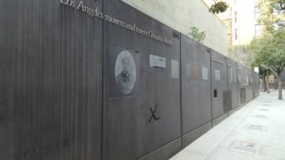 A current day photograph showing a portion of the wall with Biddy Mason's timeline explained on it