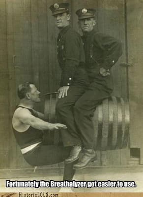 funny-pictures-history-fortunately-the-breathalyzer-got-easier-to-use Silly photo of a man and a Breathalyzer machine