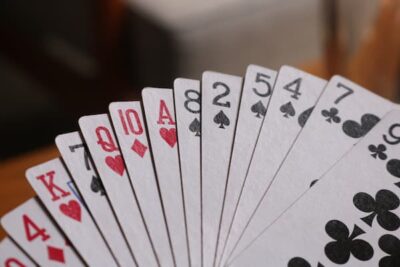 A photograph showing a mixed hand of cards.
istockphoto credit shalstack