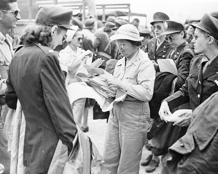 The photo shows the leader calling out assignments.
