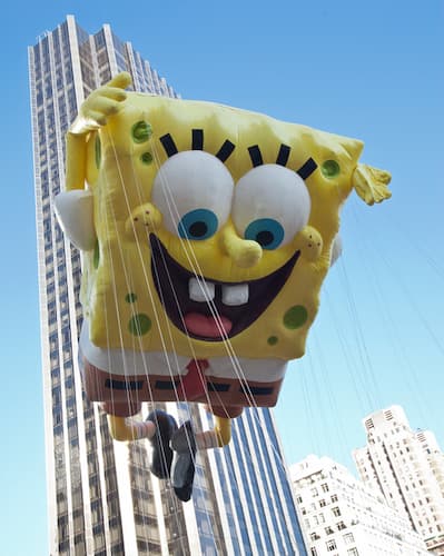 Sponge Bob balloon flying high.