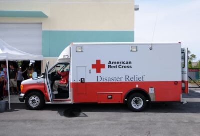 A color photograph of a modern Red Cross truck with "Disaster Relief" written on the side.
istockphoto credit icholava